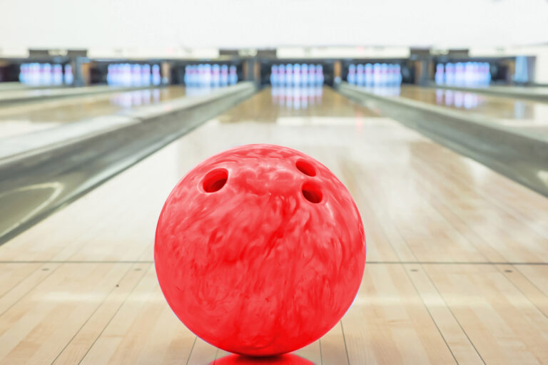 bowling ball with pins in the backgroun