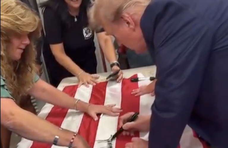 trump desecrating flag for 091224