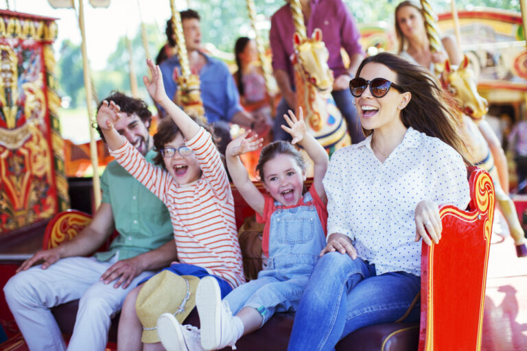 family on amusement park ride