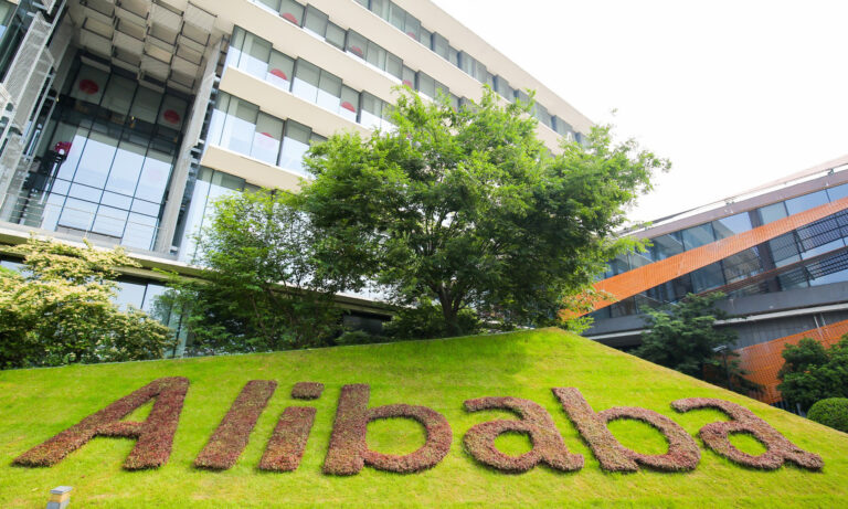 logo on front lawn spelled in grass alibaba