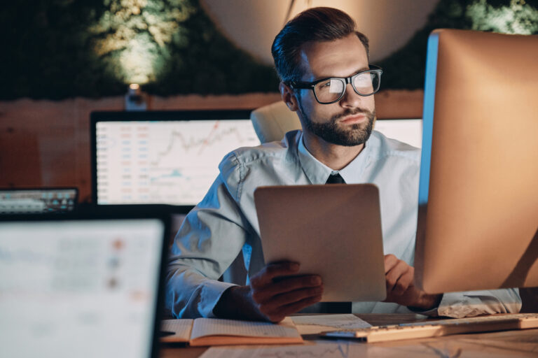 person sitting and working at a desk