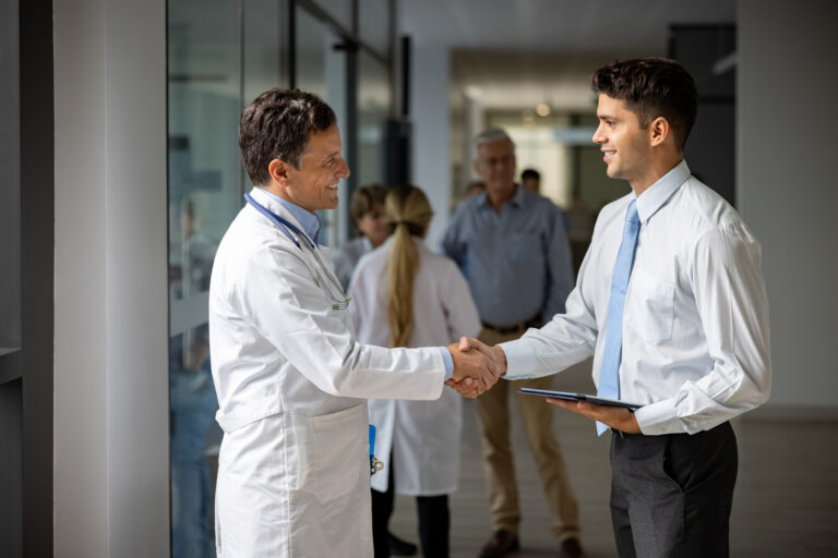 physician shaking patients hand