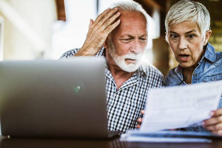 worried senior couple