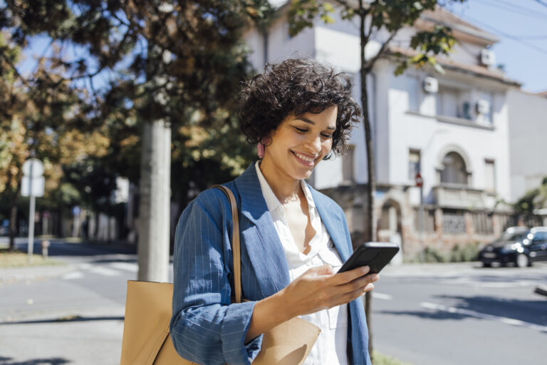 mobile phone used while walking outside gettyimages 1357947512