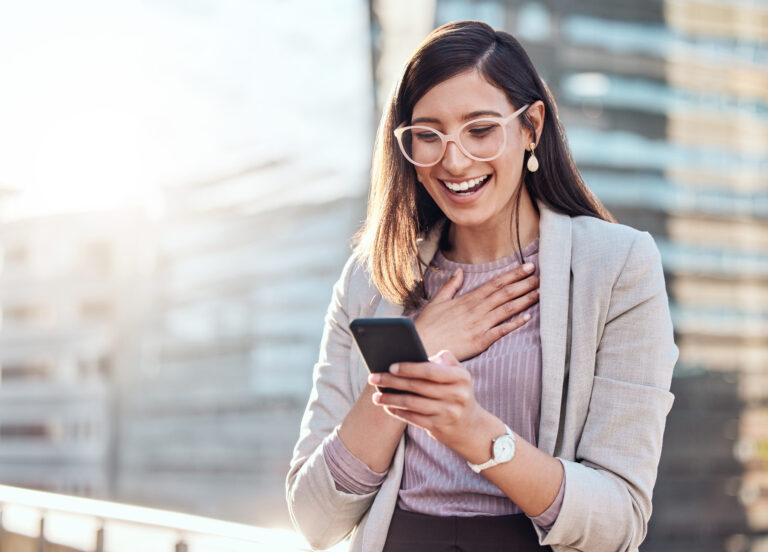 surprised person looking at cellphone outside