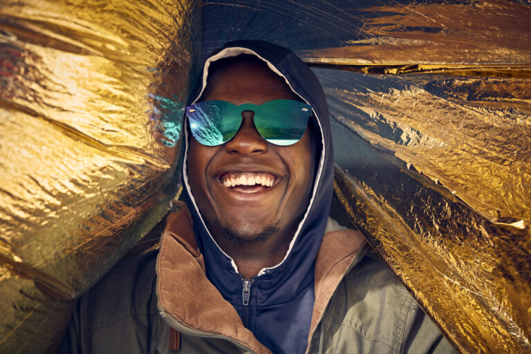 getty happy person in sunglasses smiling