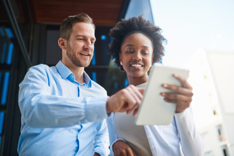 investors look at tablet outside