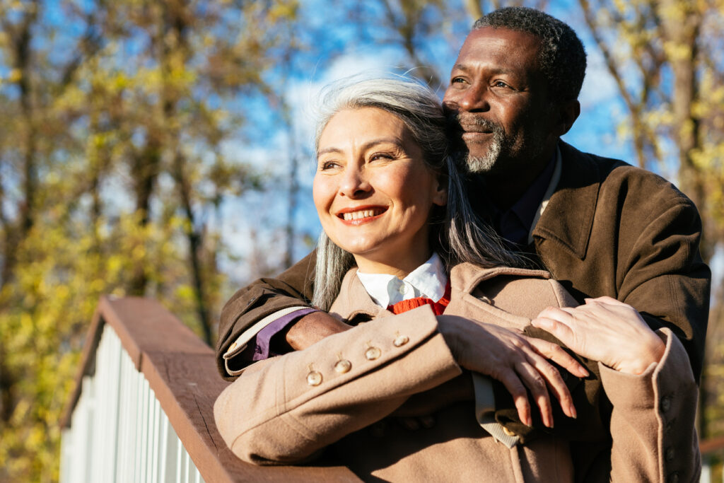 retired interracial couple hugging in love 1320x880 2aa171e