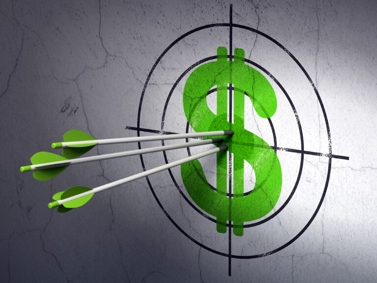 arrows hitting green dollar sign on archery target