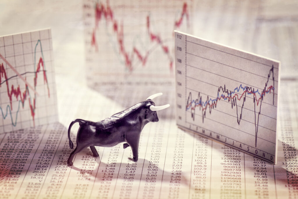 bull market rising stock charts financial newspaper quotes invest getty