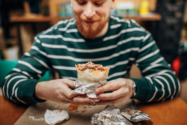 man eat burrito chipotle restaurant 1200x800 5b2df79