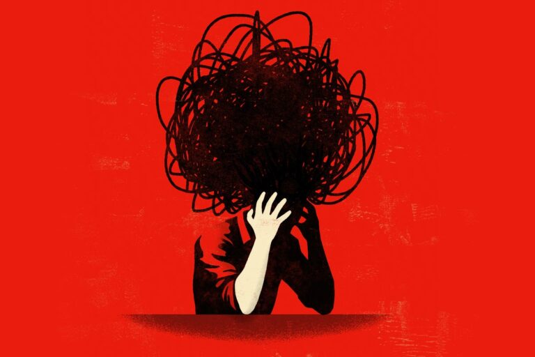 person with tangled messy head in hands