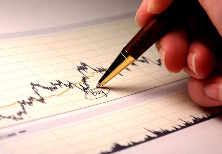 stock market candlestick chart circle buy dip invest getty