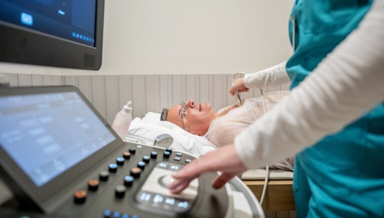 man getting heart scan