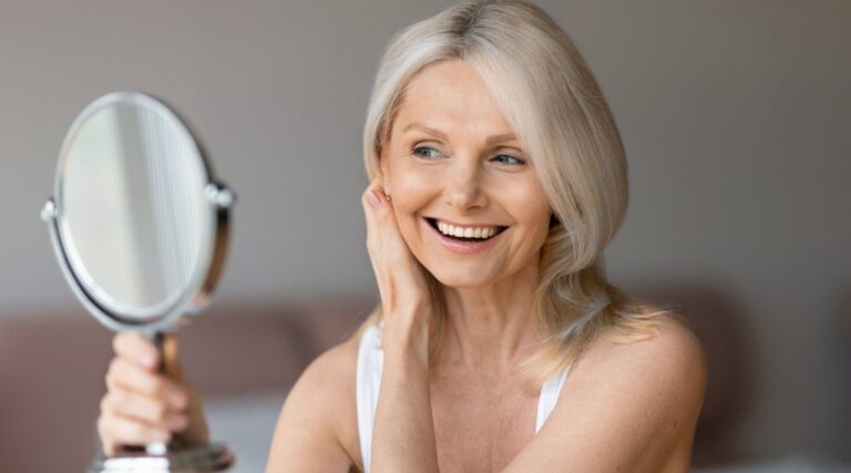 older woman hand mirror