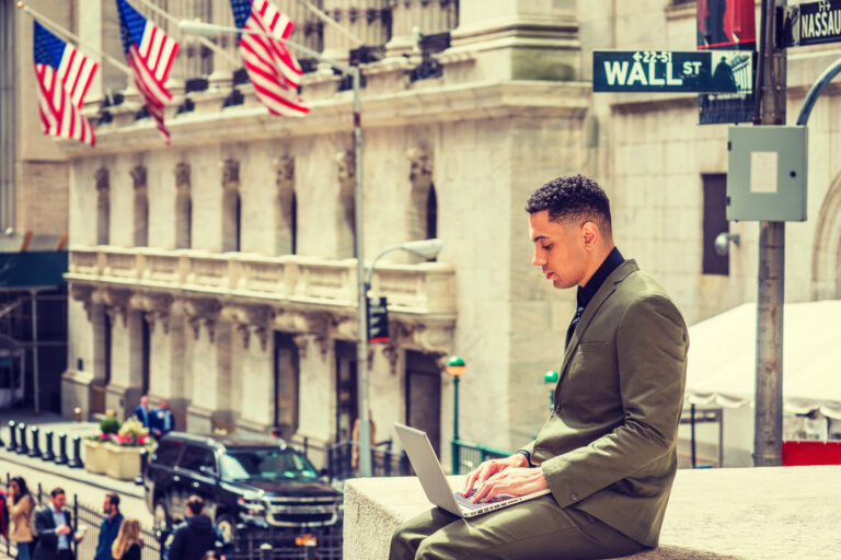 wall street young man with laptop