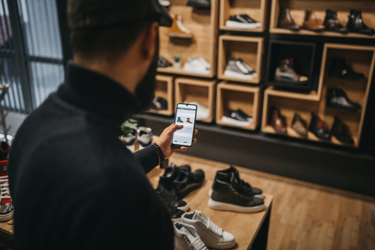 shopper comparing prices of shoes online